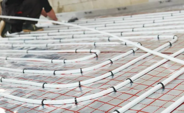 Wat is tackersysteem voor vloerverwarming?